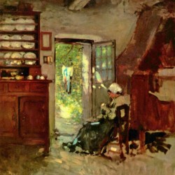 Woman standing at the kitchen entrance